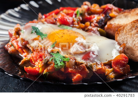 Portion of shakshuka on a plate Portion of shakshuka on a plate 40291783