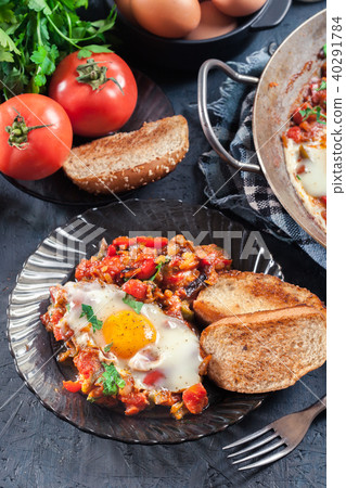 Portion of shakshuka on a plate Portion of shakshuka on a plate 40291784