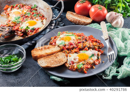 Portion of shakshuka on a plate Portion of shakshuka on a plate 40291786