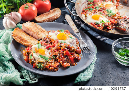 Portion of shakshuka on a plate 40291787