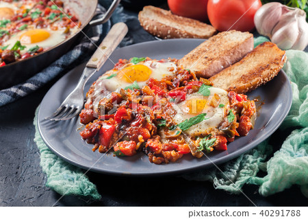 Portion of shakshuka on a plate 40291788