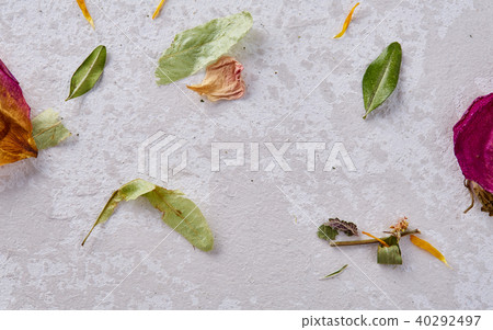 Set of assorted petals isolated on wooden background, top view, close-up, selective focus 40292497