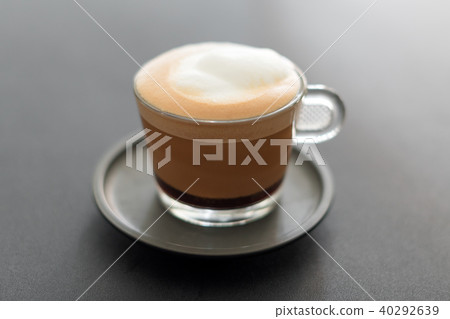 Cup of coffee. Cappuccino with foam selective focus Cup of coffee. Cappuccino with foam selective focus 40292639
