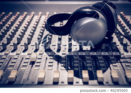 headphone on sound mixer, music background headphone on sound mixer, music background 40295005
