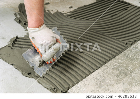 Laying Ceramic Tiles. Laying Ceramic Tiles. 40295638