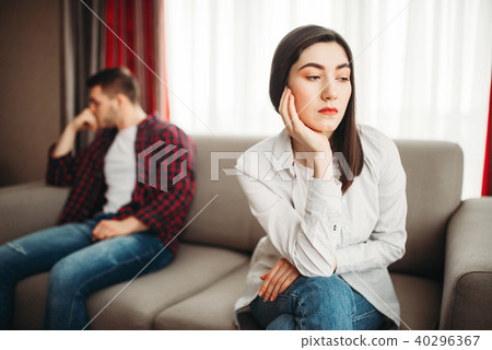 Couple sitting on couch, abuse concept 40296367