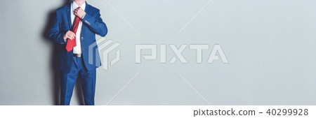 Portrait of successful businessman wearing a suit Portrait of successful businessman wearing a suit 40299928