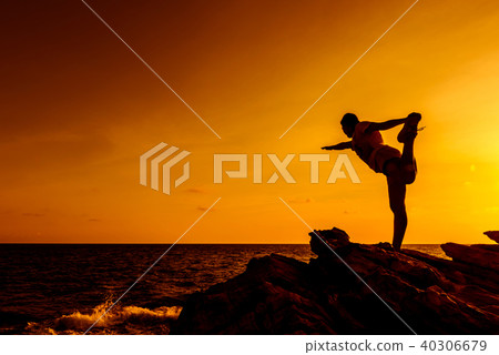 Silhouette woman yoga on the mountain sunset. Silhouette woman yoga on the mountain sunset. 40306679
