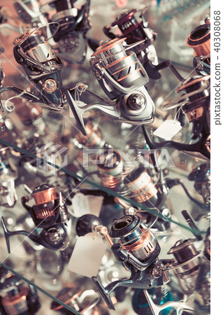 Image of stand with new baitcasting reel for rod Image of stand with new baitcasting reel for rod 40308068