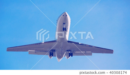 Passenger plane departing in afternoon Passenger plane departing in afternoon 40308174