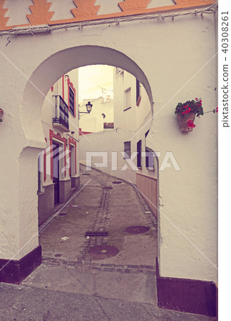 archway at picturesque street Olvera 40308261