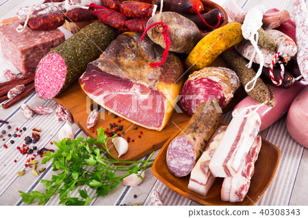 Variety of meats on table 40308343
