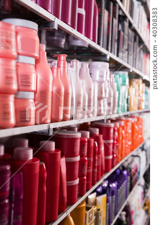 Picture of showcase with bottles of shampoos and conditioners Picture of showcase with bottles of shampoos and conditioners 40308383