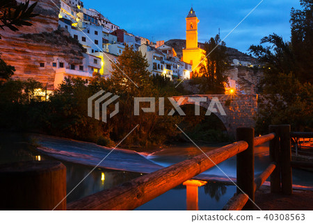 night view of Alcala del Jucar with bell tower and bridge night view of Alcala del Jucar with bell tower and bridge 40308563