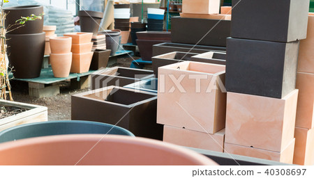 Image of rows with clay pots for flowers Image of rows with clay pots for flowers 40308697