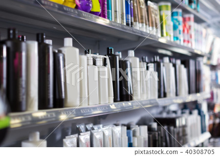 Shelves with hair care products in a cosmetics showroom 40308705