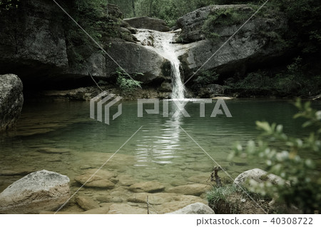 Waterfall in Catalonia surrounded by beautiful forests 40308722