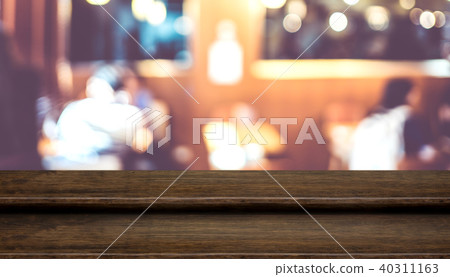 wood table top food stand with blur people dinning 40311163