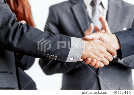 Handshake of business partners 40311410