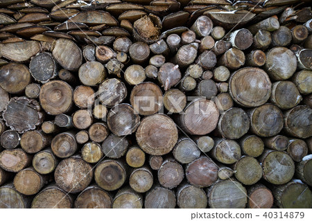 Spruce wood in the background. Firewood stack. 40314879