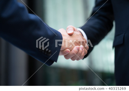Businessman handshake 40315269