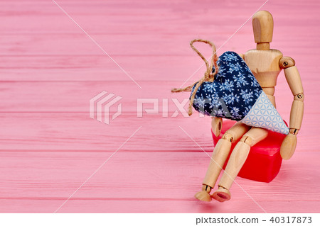 Human wooden dummy with heart, copy space. 40317873