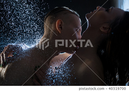 Nude African-American Couple Embracing