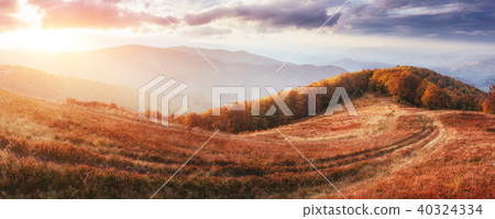 Waterfall in autumn sunlight. Beauty world. Carpathians. Ukraine. Europe Waterfall in autumn sunlight. Beauty world. Carpathians. Ukraine. Europe 40324334