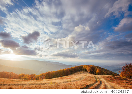 Waterfall in autumn sunlight. Beauty world. Carpathians. Ukraine. Europe Waterfall in autumn sunlight. Beauty world. Carpathians. Ukraine. Europe 40324357