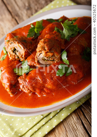 Italian meat roll braciole stuffed with parsley 40325672