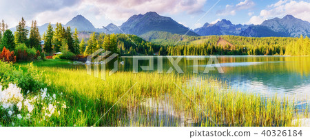 Majestic mountain lake in National Park High Tatra. Strbske ples Majestic mountain lake in National Park High Tatra. Strbske ples 40326184