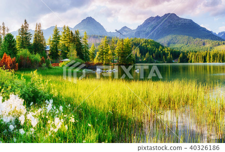 Majestic mountain lake in National Park High Tatra. Strbske ples Majestic mountain lake in National Park High Tatra. Strbske ples 40326186