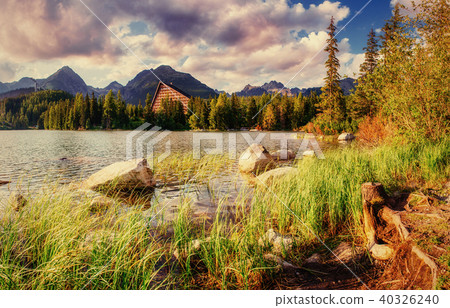 The sunrise over a lake in the park High Tatras. Shtrbske Pleso, 40326240