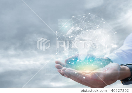 Businessman holding in hand with global connection Businessman holding in hand with global connection 40327202