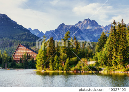 The sunrise over a lake in the park High Tatras. Shtrbske Pleso, 40327403