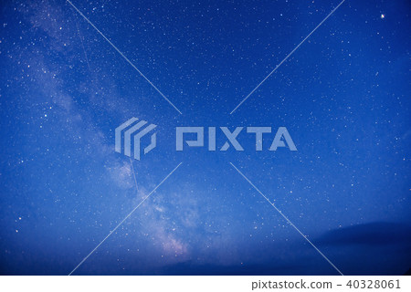 fantastic winter meteor shower and the snow-capped mountains. fantastic winter meteor shower and the snow-capped mountains. 40328061