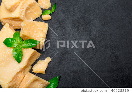pieces of parmesan or parmigiano cheese pieces of parmesan or parmigiano cheese 40328219
