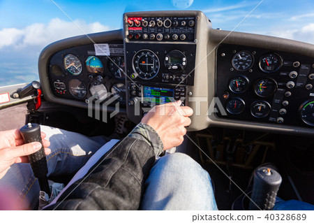 Pilot flying a private sport airplane 40328689