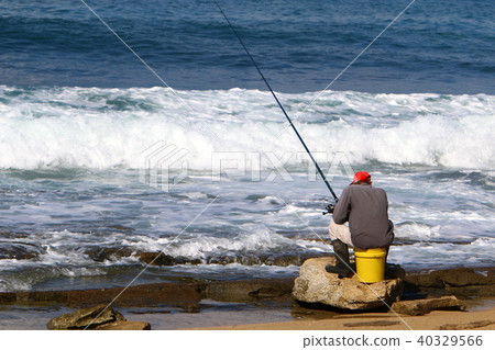 man on the shores of the Mediterranean Sea 40329566