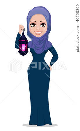 Muslim woman holding Arabic lantern Muslim woman holding Arabic lantern 40330869