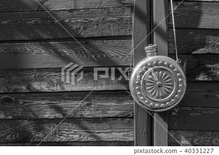 Vintage jar on the background of a wooden wall Vintage jar on the background of a wooden wall 40331227