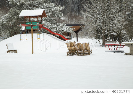 Children's Playground covered with snow  40331774