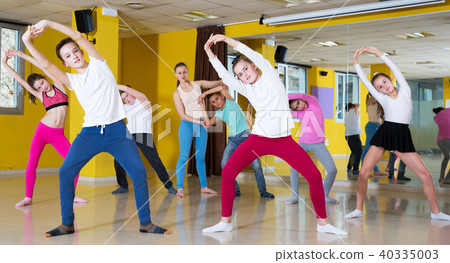 Tweens training dance movements in class Tweens training dance movements in class 40335003