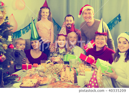 Family exchanging Christmas gifts 40335209