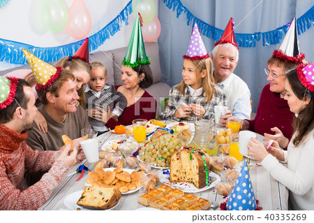 Family members are happy to celebrate children’s birthday Family members are happy to celebrate children’s birthday 40335269