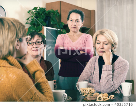 sad female pensioners 40335716
