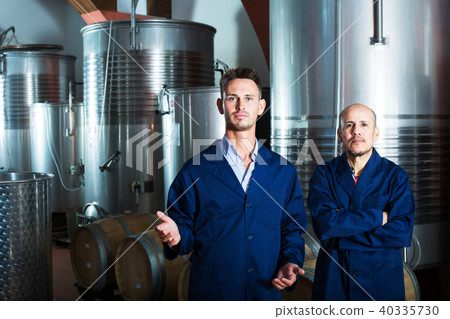 two coworkers in wine factory two coworkers in wine factory 40335730