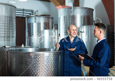 experts men standing with clipboard experts men standing with clipboard 40335758