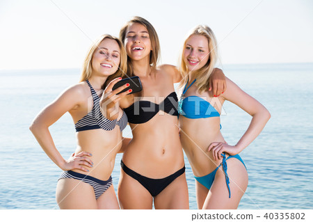 Three girls taking self portrait 40335802