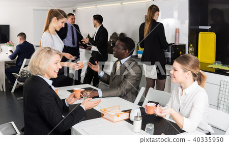 people at a coffee break in the office 40335950